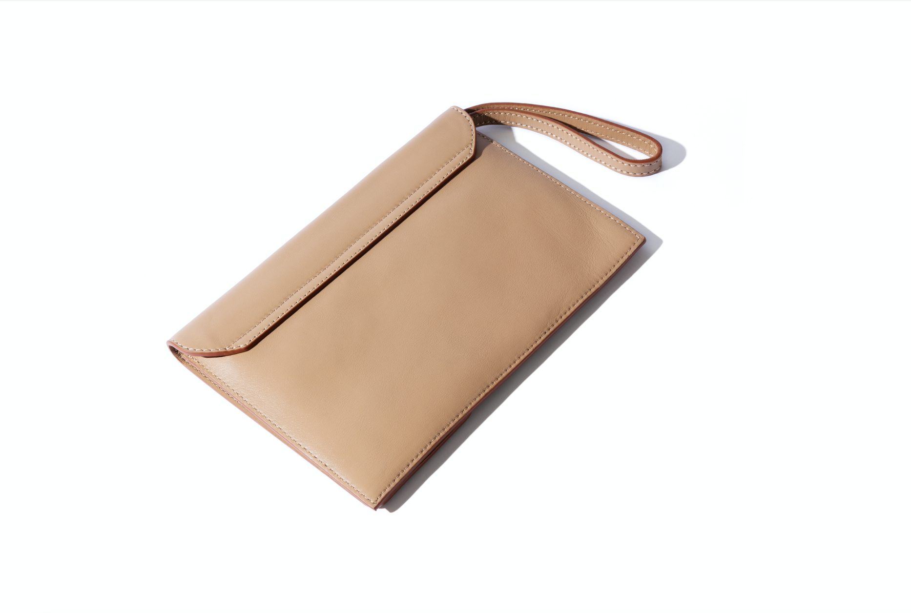camille clutch in biscotto leather and suede